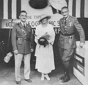 Mrs. Berry, the governor's wife, christening the gondola by pouring liquid oxygen over it (National Geographic Magazine)