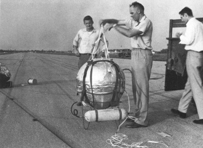 Major David Simons is preparing one of the gondolas to be launched in the three flights discussed in this article. Credit: Winzen Research Inc.